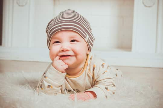 How Infants Start the Journey to Their First Word