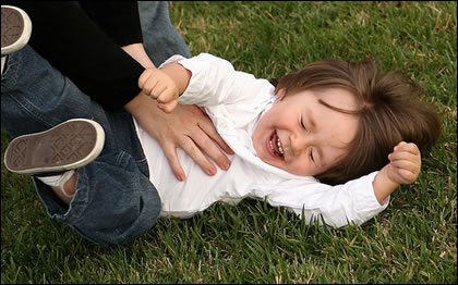 Tickling a baby